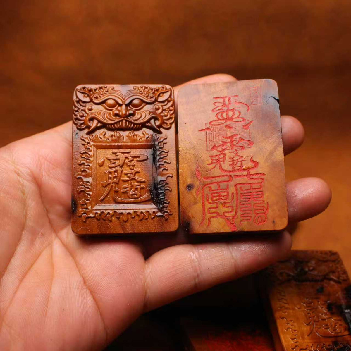 Carved jujube wood Taoist Tai Sui peace plaque with guardian-face border and red talisman inscription