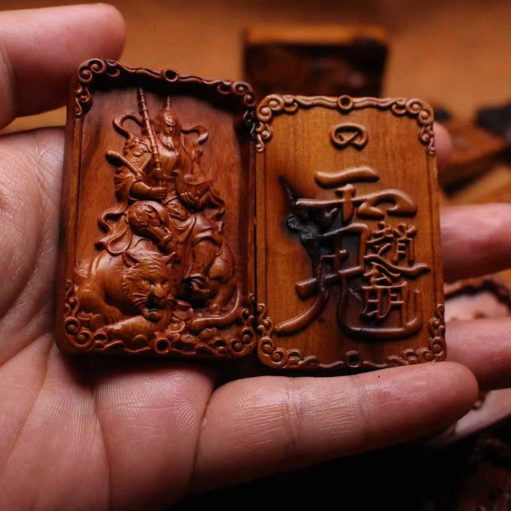 Carved jujube wood Zhao Xuantan or Marshal Xuantan Taoist wealth deity plaque with raised figure and Chinese inscription