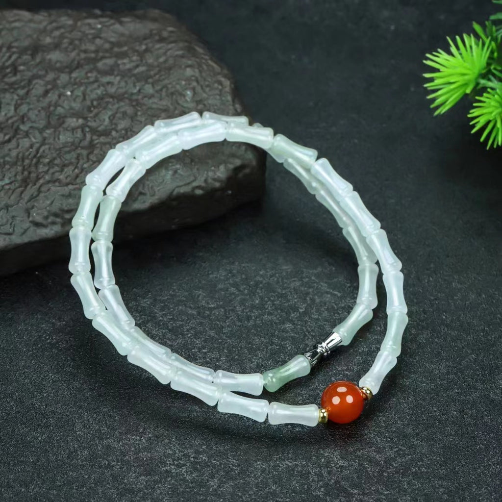 Tianshan Cui segmented bead necklace with red accent bead