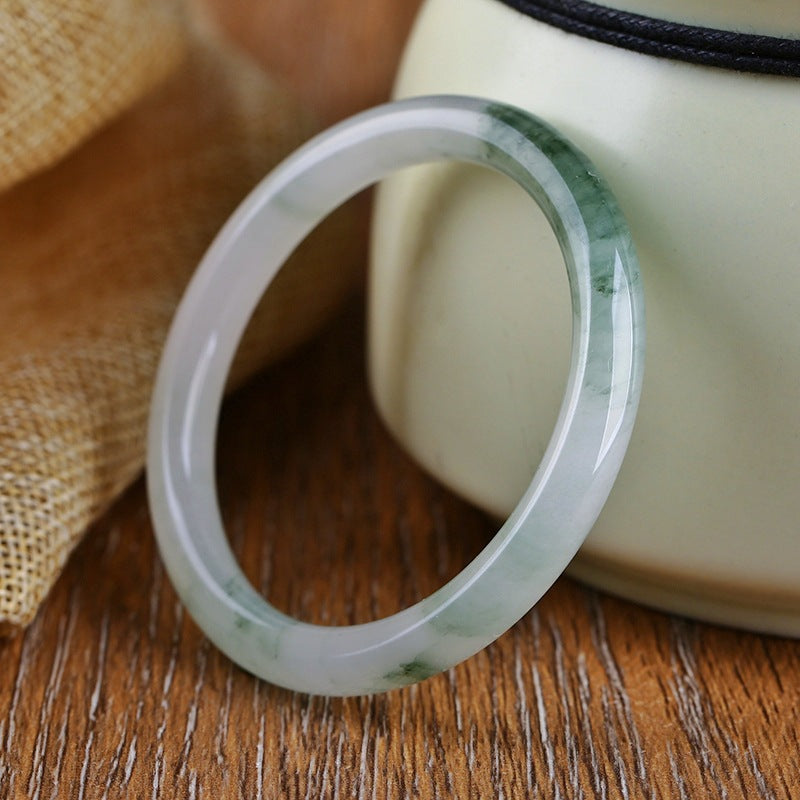 Tianshan Cui pale green quartzite bangle styled on wrist