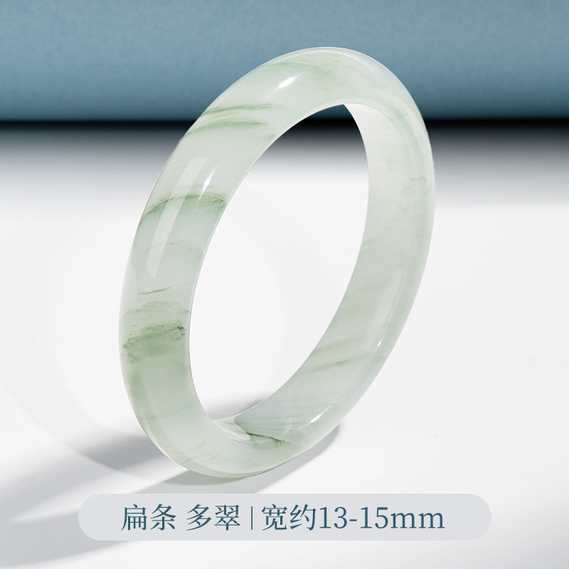 Natural Tianshan Cui quartzite bangle with pale green and white polished stone pattern