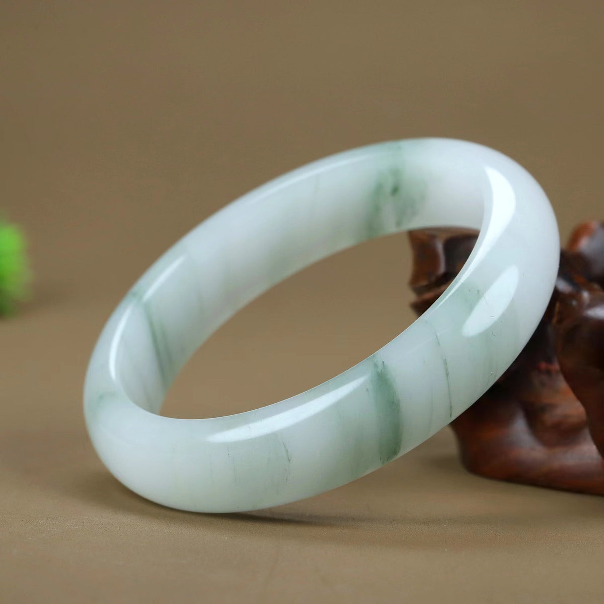 Wide pale green Tianshan Xuecui stone bangle