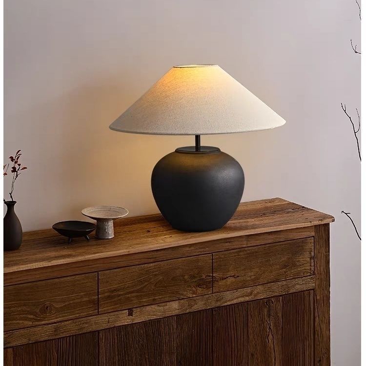 Matte black wabi-sabi ceramic table lamp with broad linen shade