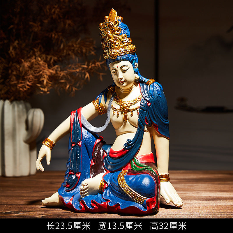 Water Moon Guanyin decorative statue with blue robes and gold crown