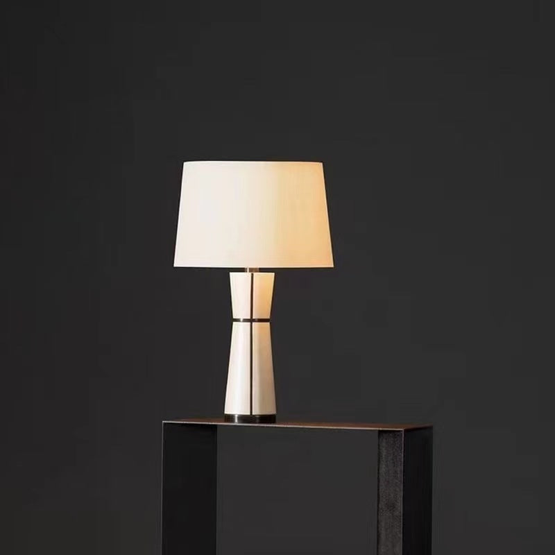 White and black geometric table lamp with fabric shade