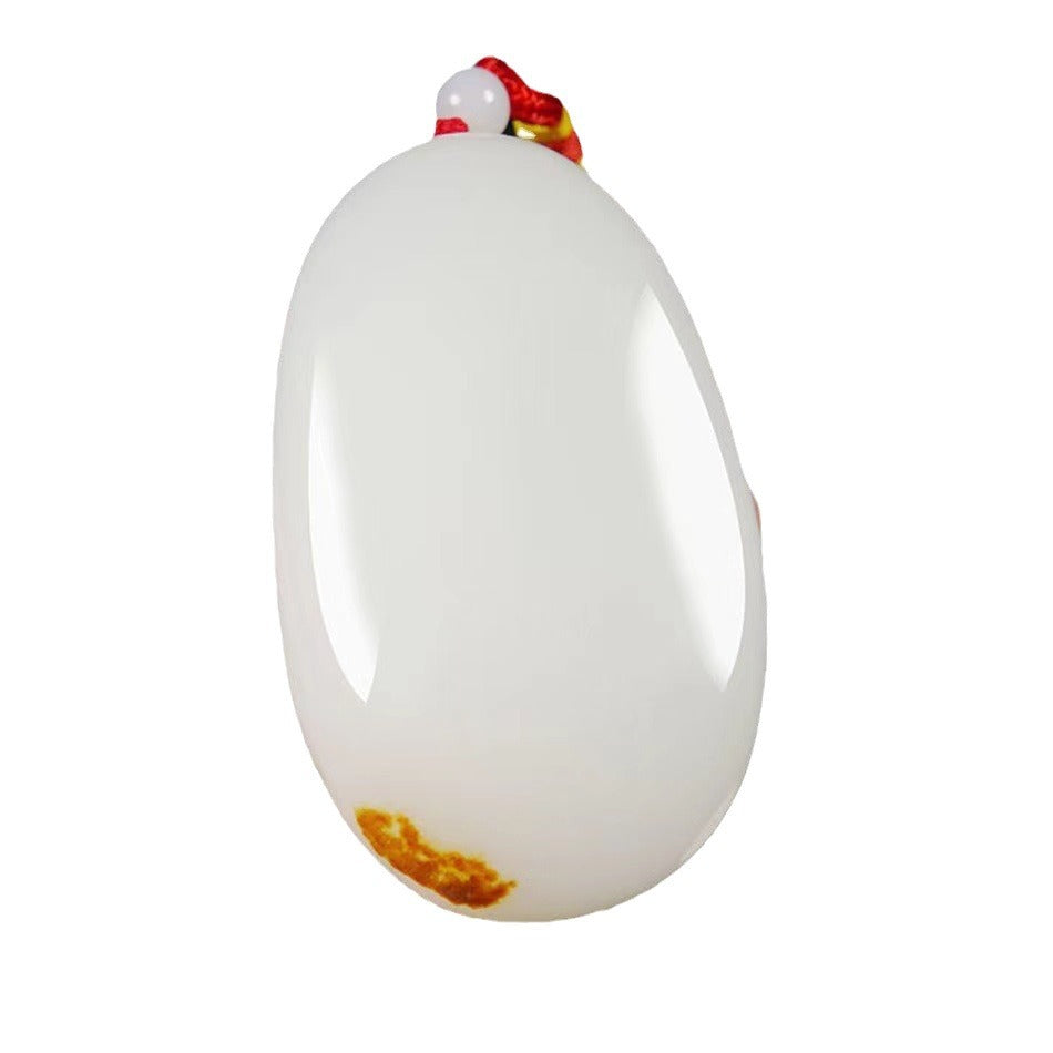 White polished palm stone on clean background