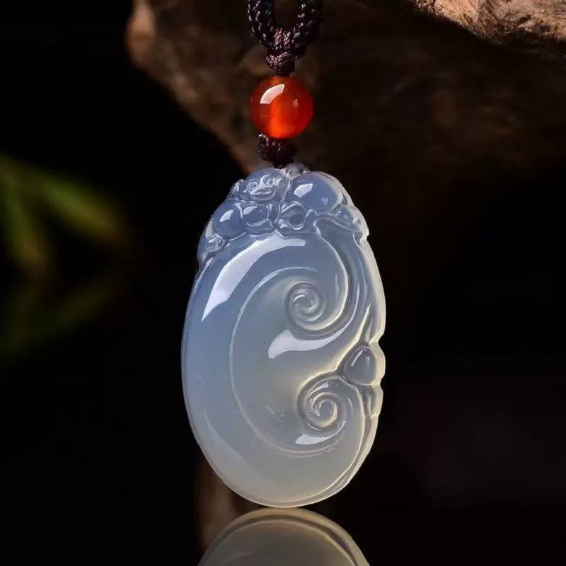 White chalcedony Ruyi pendant with cloud-scroll carving