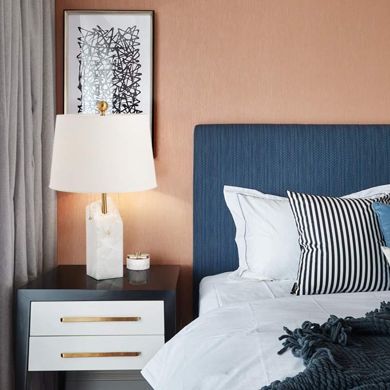 White cloud stone mosaic table lamp with linen shade in bedroom