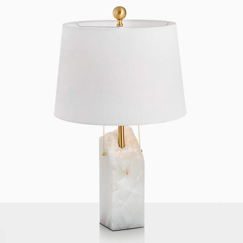 White cloud stone rectangular table lamp with brass accents and fabric shade