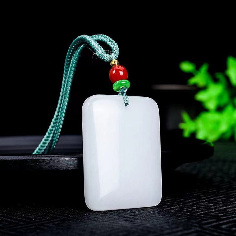 White minimalist Wu Shi Pai stone pendant with cord
