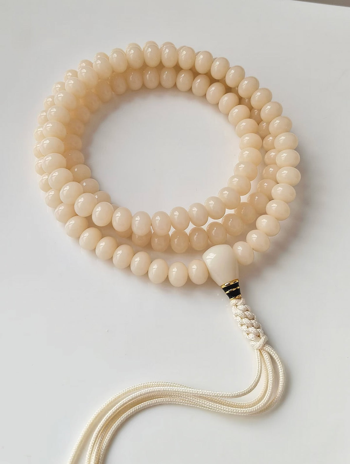 White Jade Bodhi Dew Zen 8x10mm warm ivory prayer bead strand with soft tassel