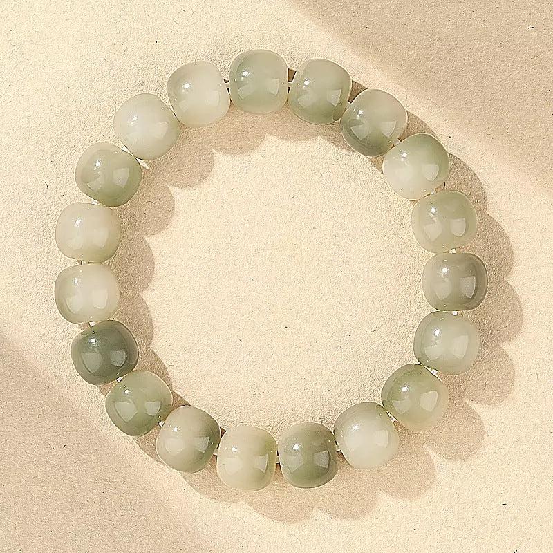 White Jade Bodhi Root bracelet with pale green gradient beads
