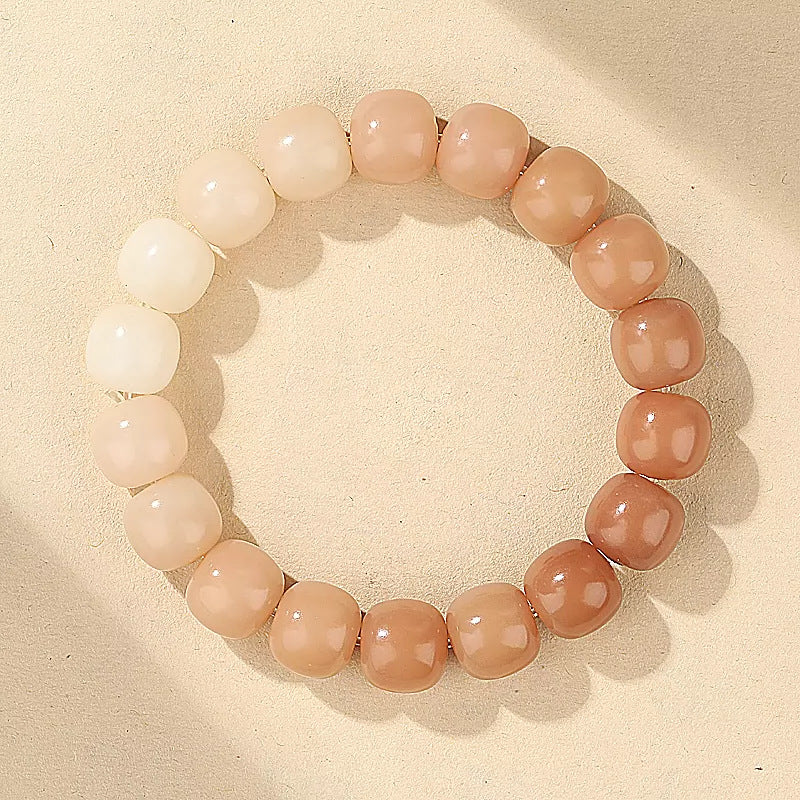 White Jade Bodhi Root bracelet with peach blush gradient beads