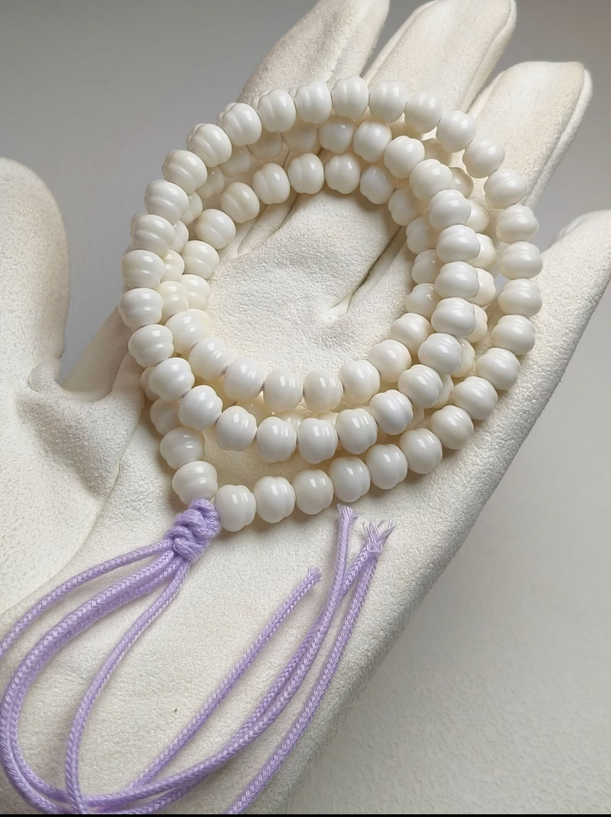 White Jade Bodhi Yingluo Pure White prayer bead strand with lavender cord tassels
