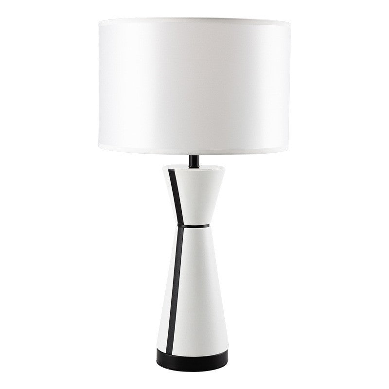 White leather designer table lamp in modern bedroom