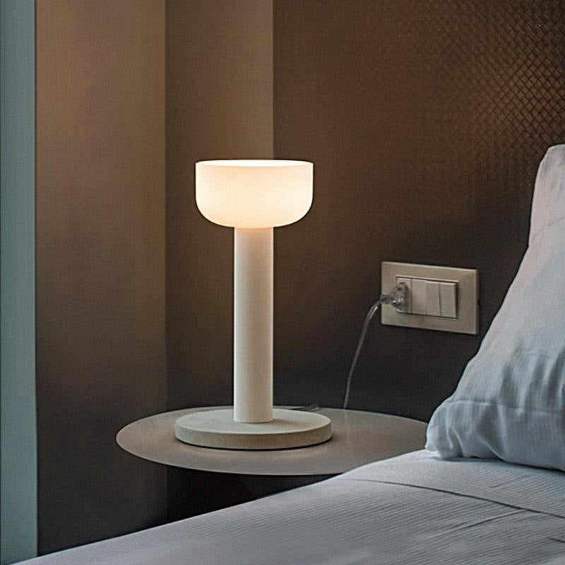 White macaron LED table lamp with marble base in bedroom