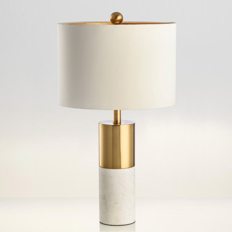 White natural marble column table lamp with brass body and cream fabric shade