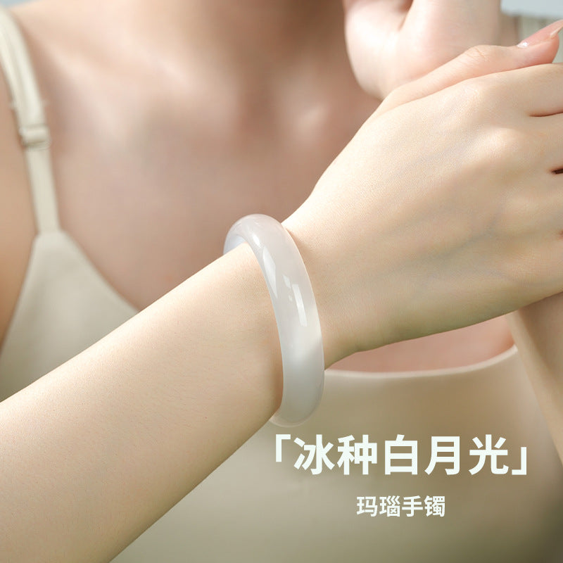 White Moonlight chalcedony bangle styled on wrist