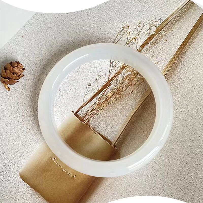 Icy white chalcedony bangle lifestyle view