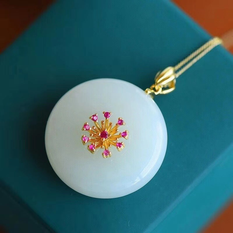 White polished round pendant necklace with flower motif detail