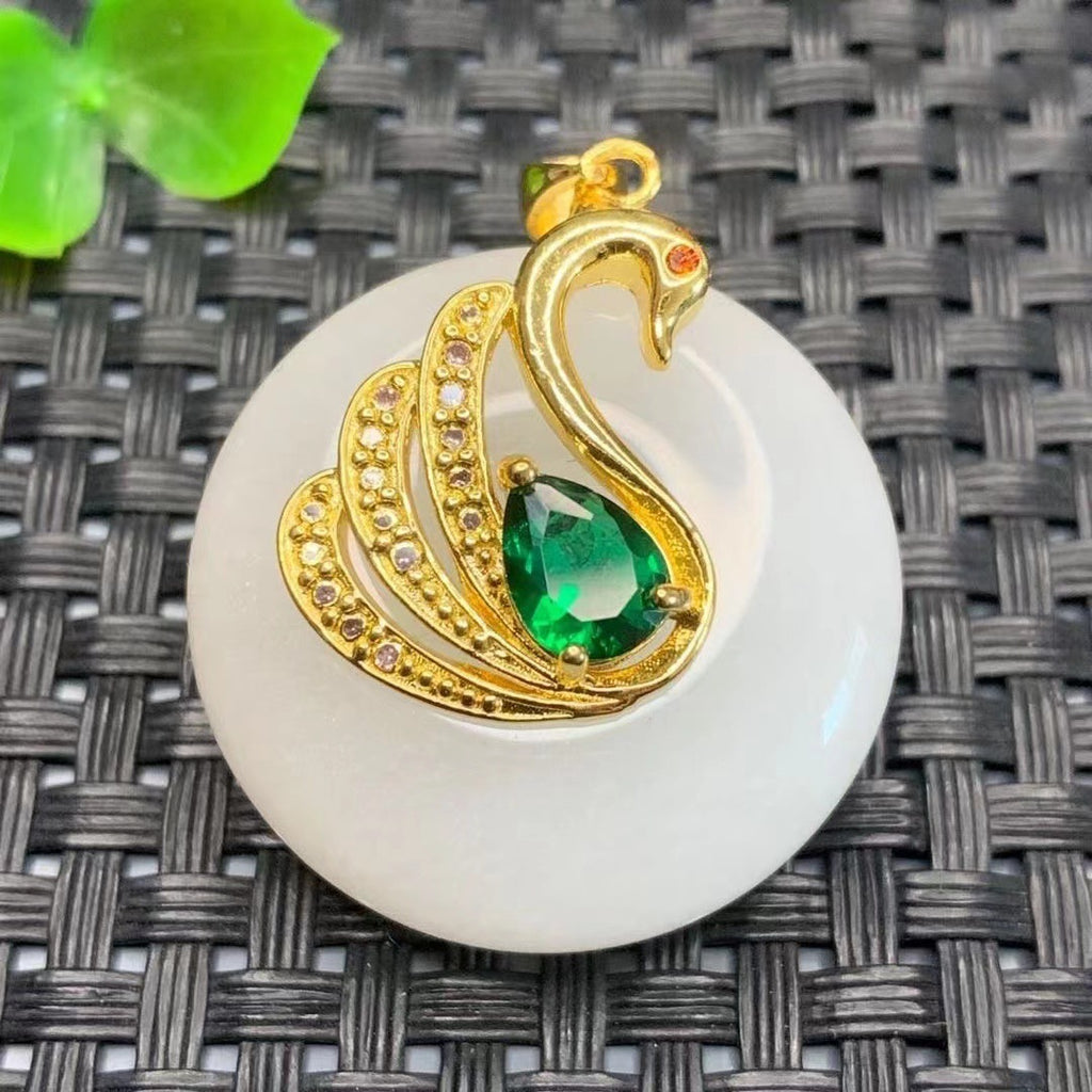 Three white peace buckle pendant style options with decorative gold-tone settings