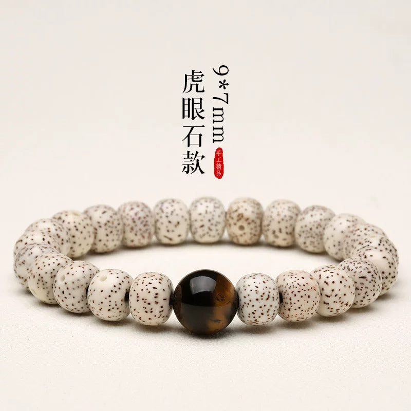 White Xingyue Bodhi bracelet with tiger-eye-style focal bead, 7×9mm