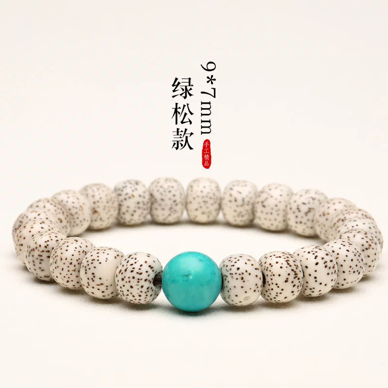 White Xingyue Bodhi bracelet with turquoise-tone round focal bead, 7×9mm