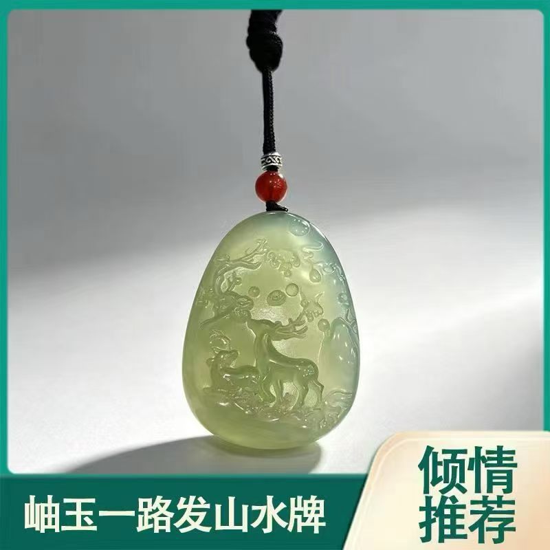 Xiuyan jade deer landscape pendant in pale green translucent stone