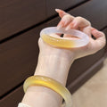 Certified natural yellow agate and chalcedony bangle with icy honey gradient
