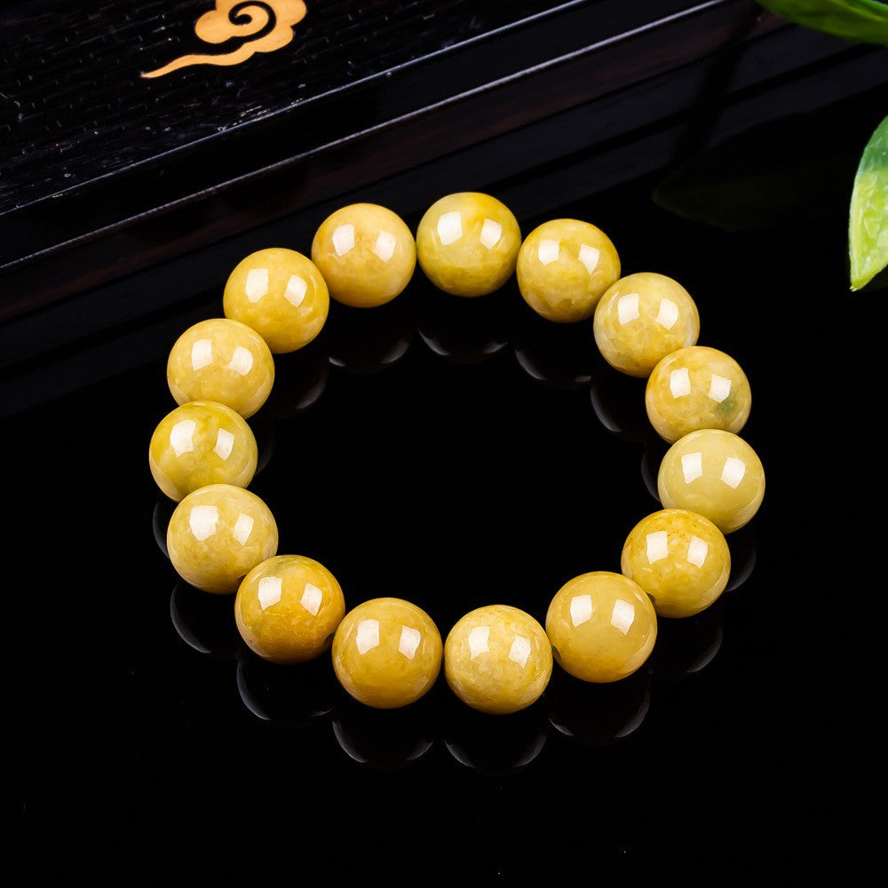 Certified yellow jadeite bracelet with warm golden honey tone