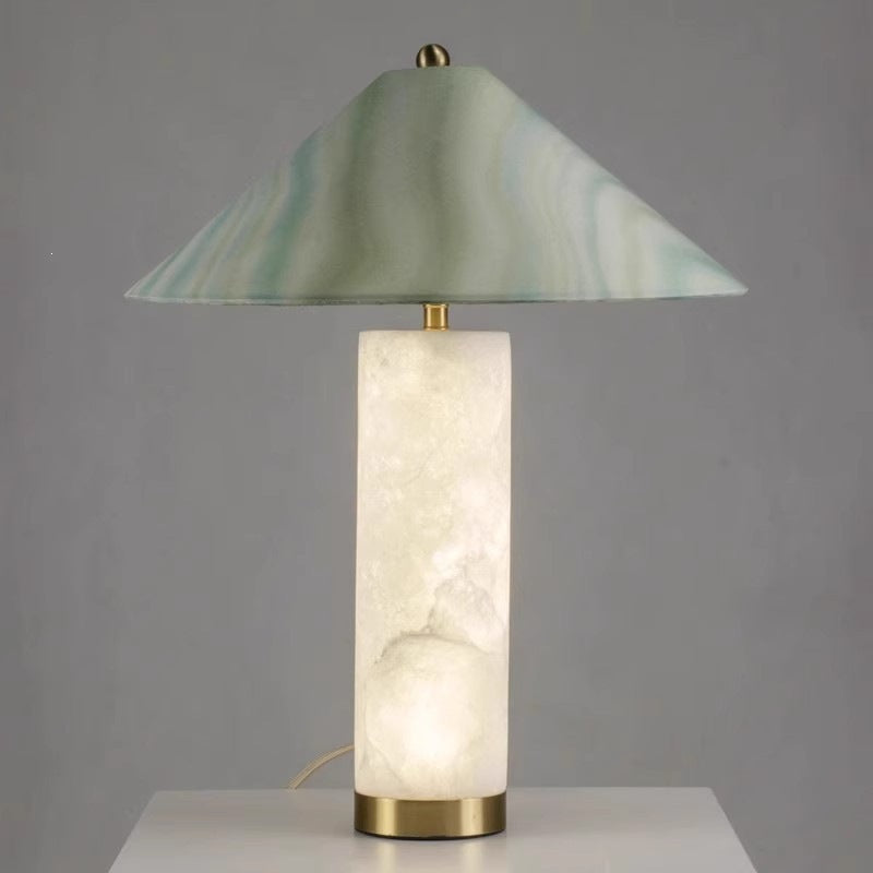 Green veined conical cloud-stone lamp with warm glowing translucent column