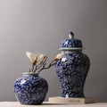 Cobalt blue floral ginger jar pair with open-mouth jar and lidded temple jar