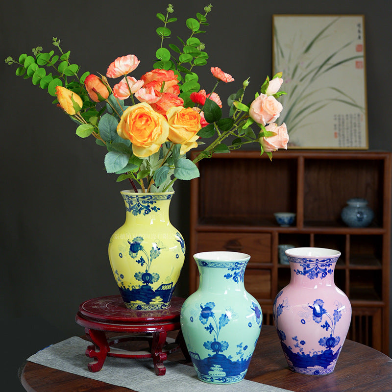 Yellow, celadon green and blush pink floral ceramic vases styled with fresh flowers