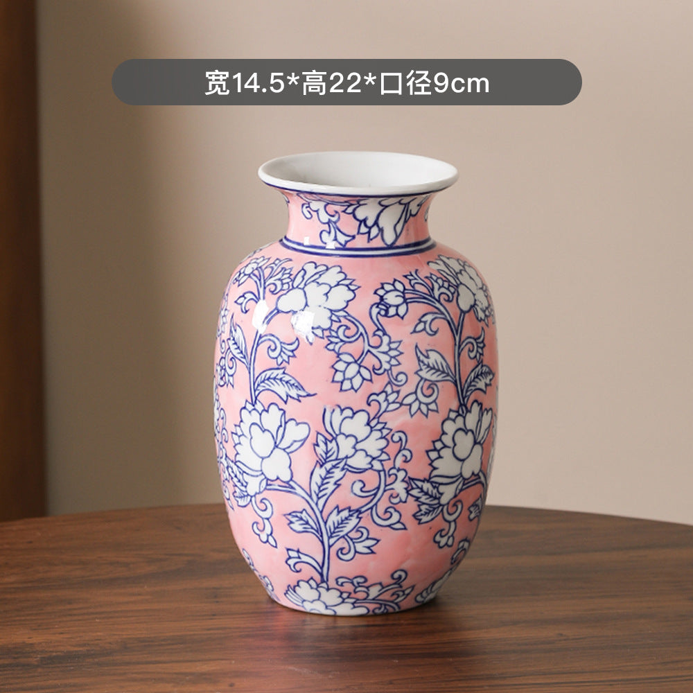 Coral pink and blue floral vase, 14.5 cm wide and 22 cm high