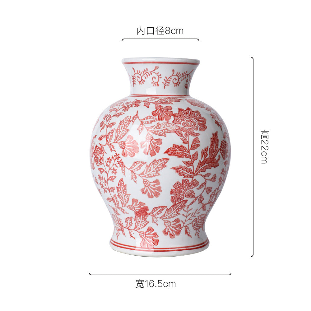 Coral red botanical ceramic jar, 16.5 cm wide and 22 cm high