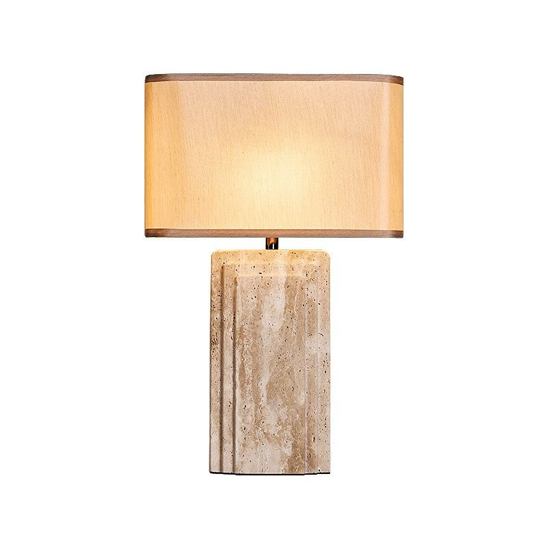 Tall rectangular cream travertine table lamp with warm fabric shade