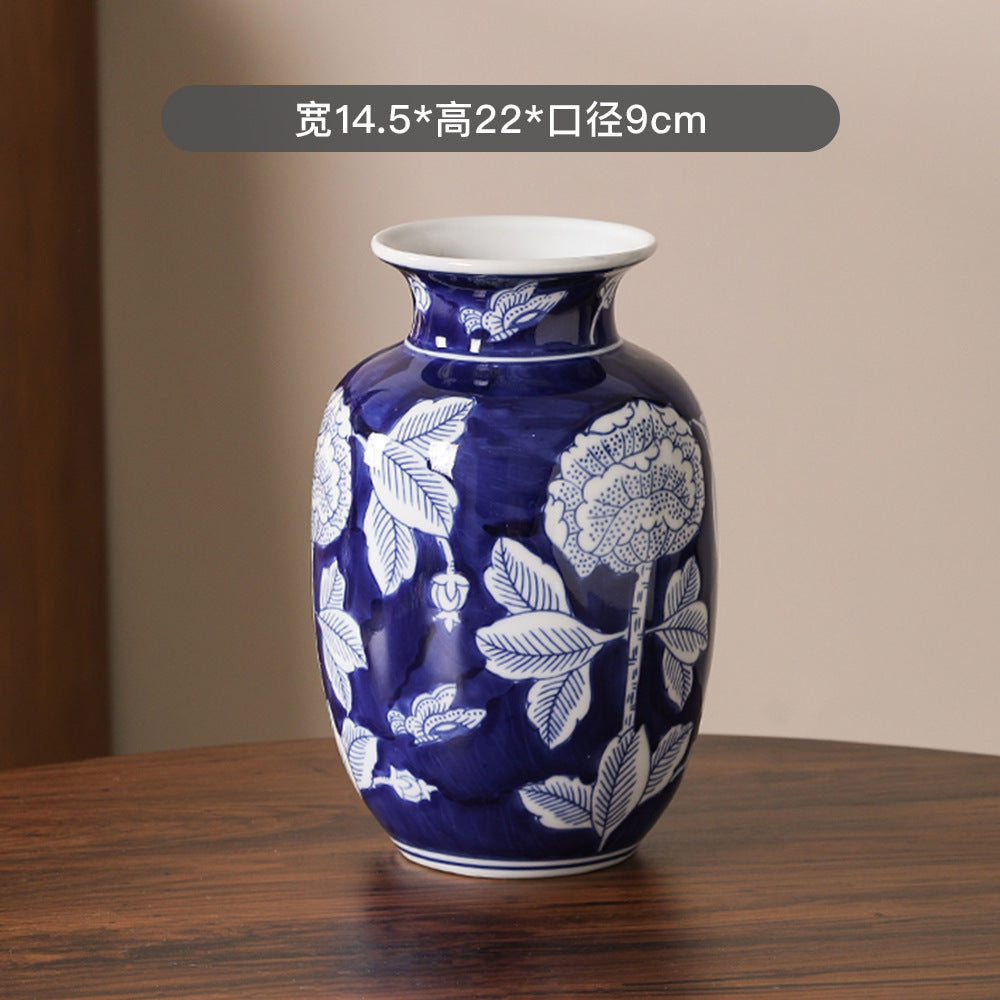 Deep indigo and silver peony vase, 14.5 cm wide and 22 cm high