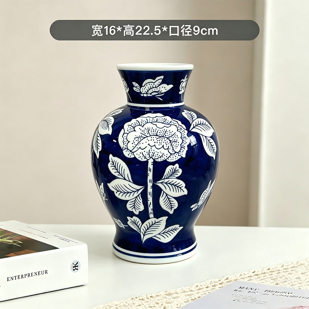Deep indigo and white peony vase, 16 cm wide and 22.5 cm high