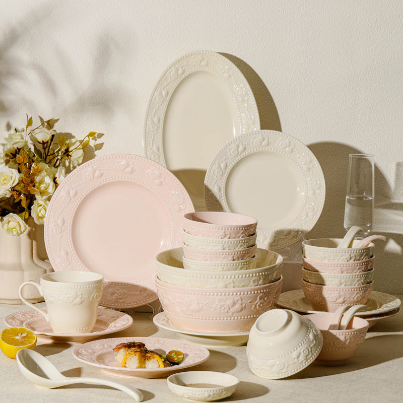 Embossed strawberry ceramic dinnerware collection in ivory and blush pink