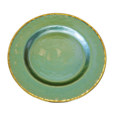 Emerald green glass charger plate with gold-tone rim for layered luxury table settings