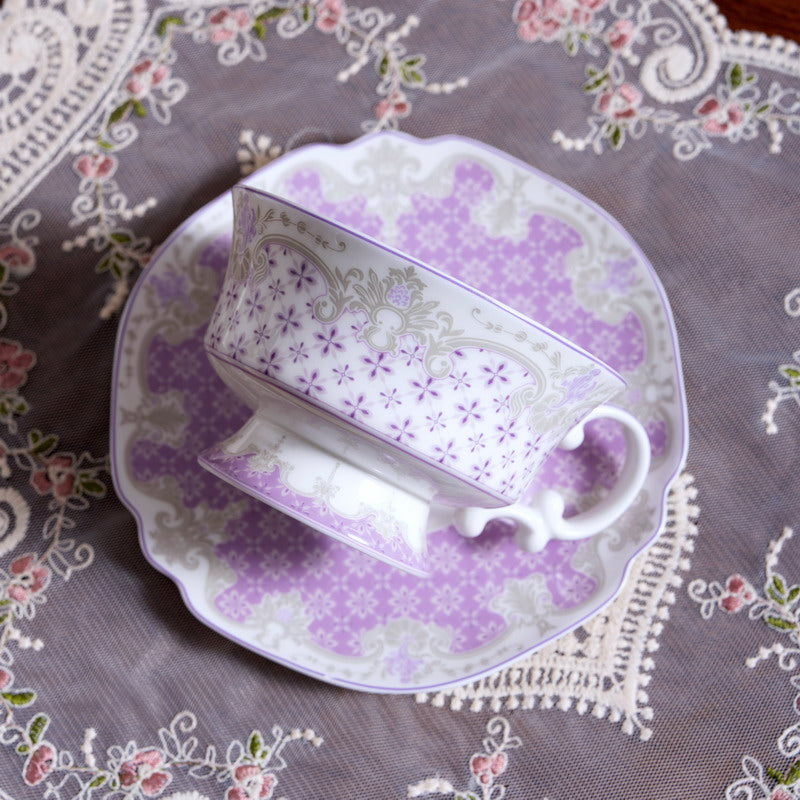 High bone china feather-lattice coffee cup and saucer detail with refined European palace ornament