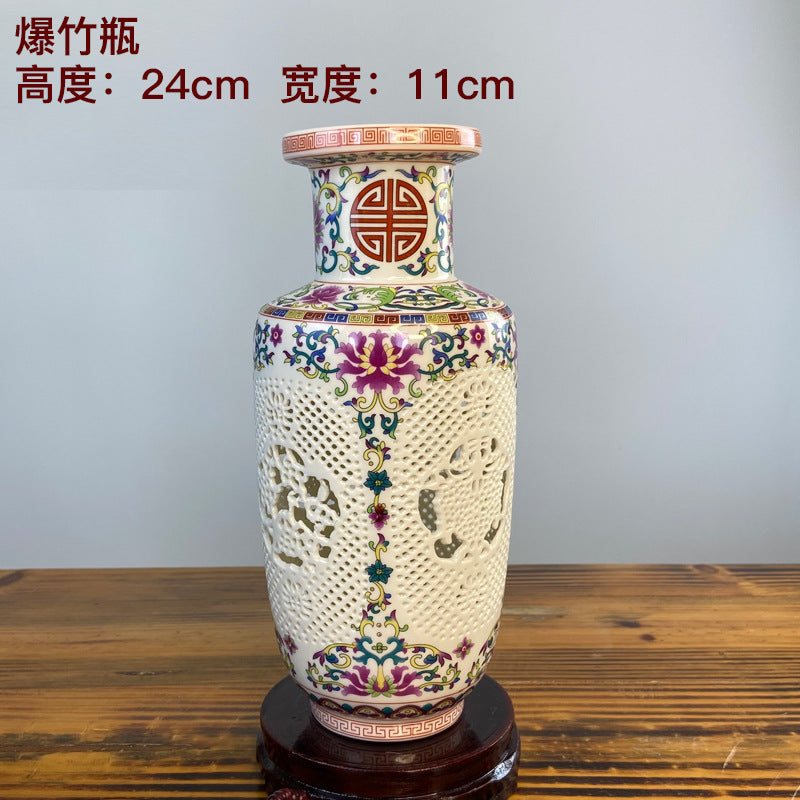 Firecracker form famille rose openwork porcelain vase, 24 cm