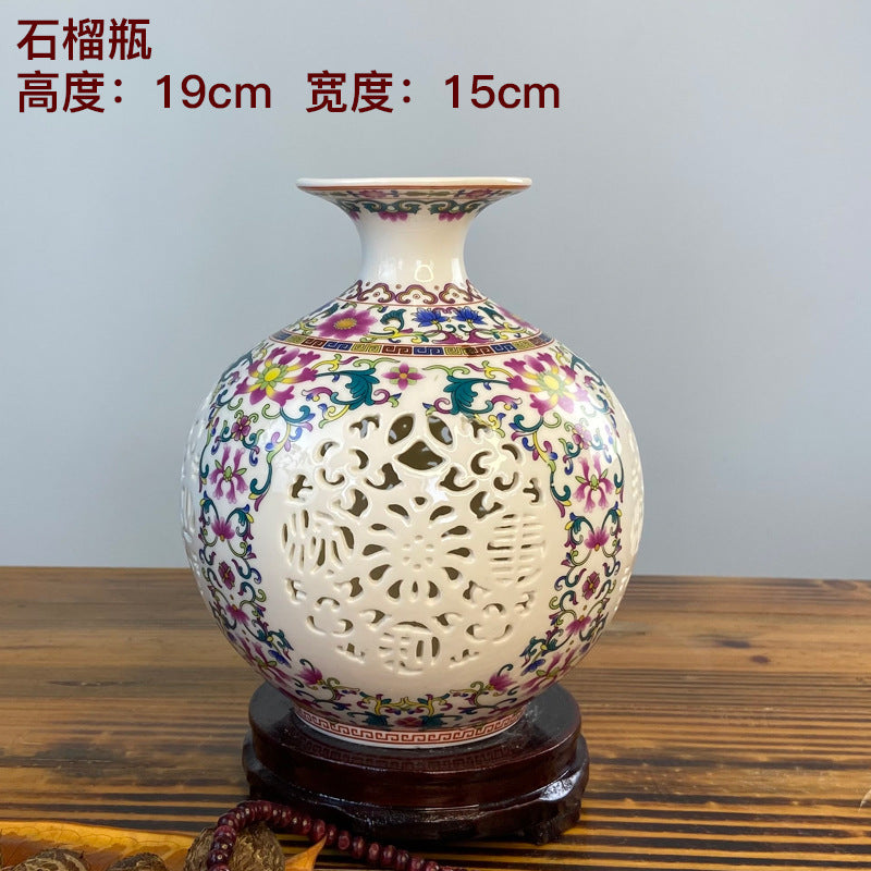 Pomegranate form famille rose openwork porcelain vase, 19 cm