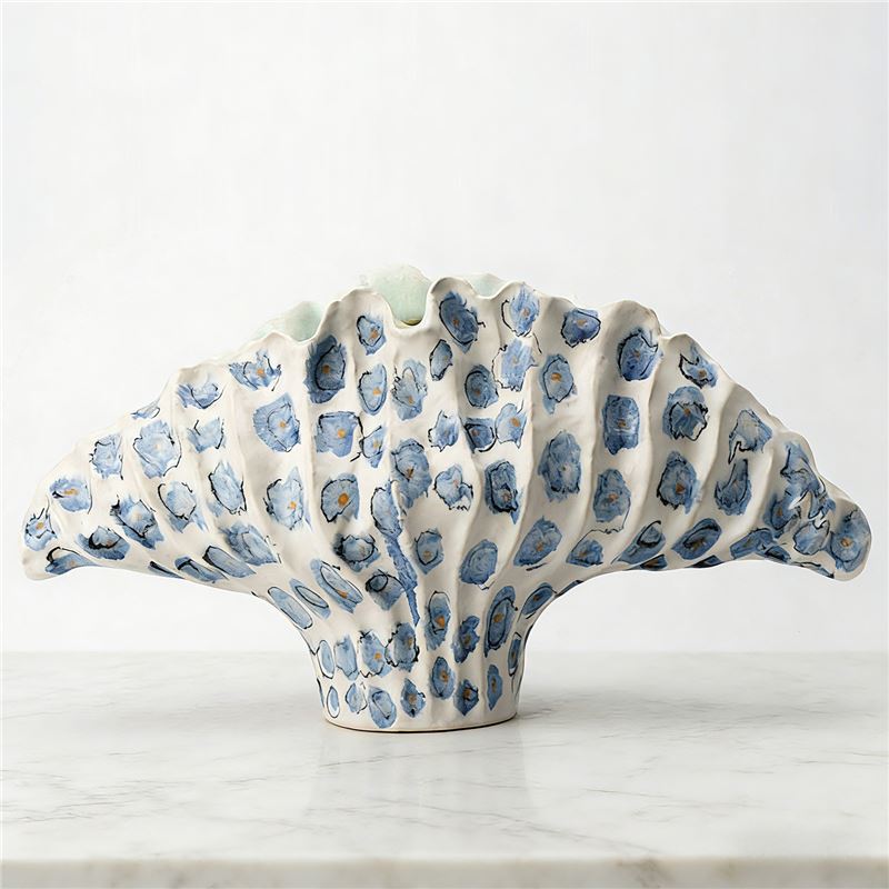 Cobalt Pebble sculptural fan ceramic vase styled on stone surface