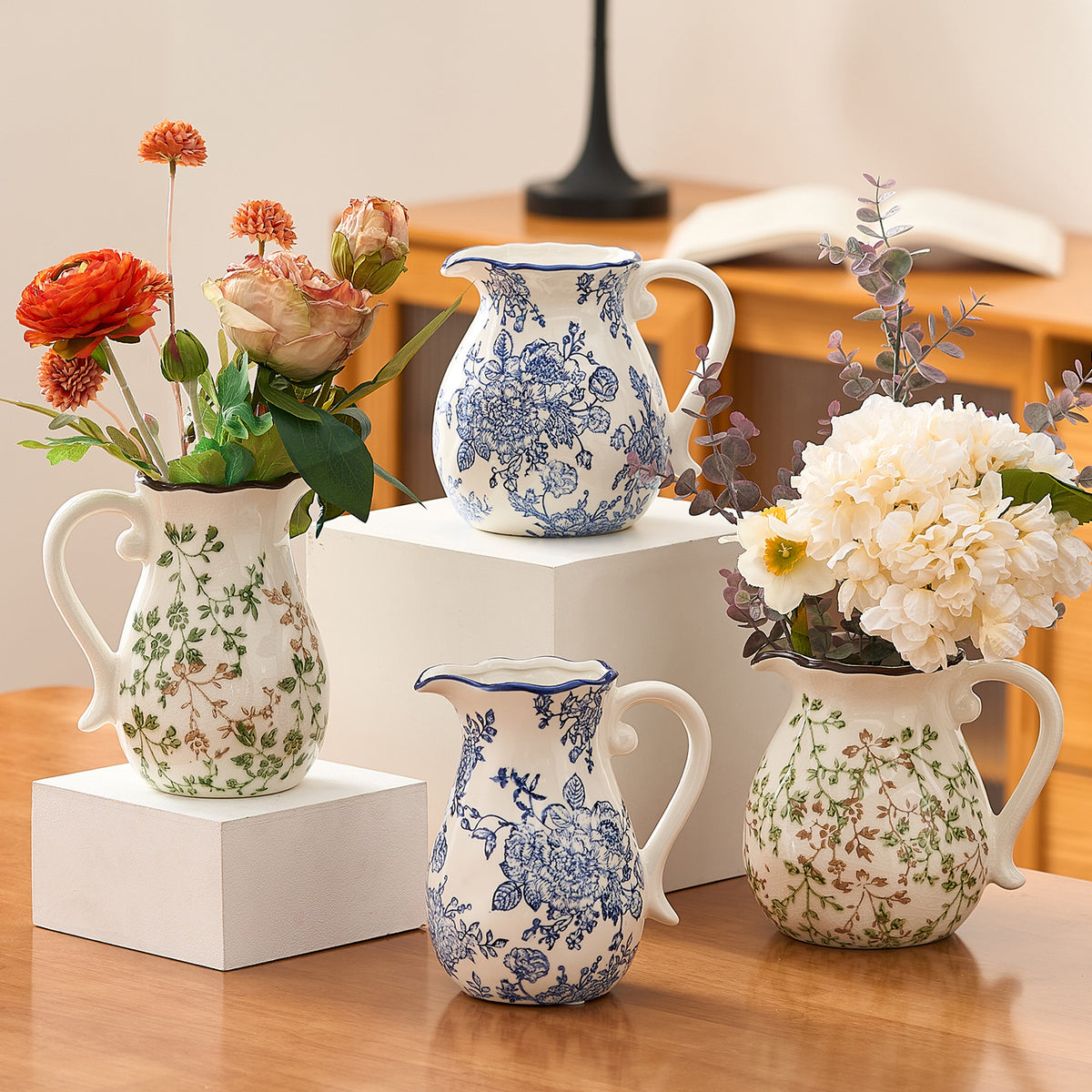 Blue peony and green branch ceramic pitcher vase collection styled together