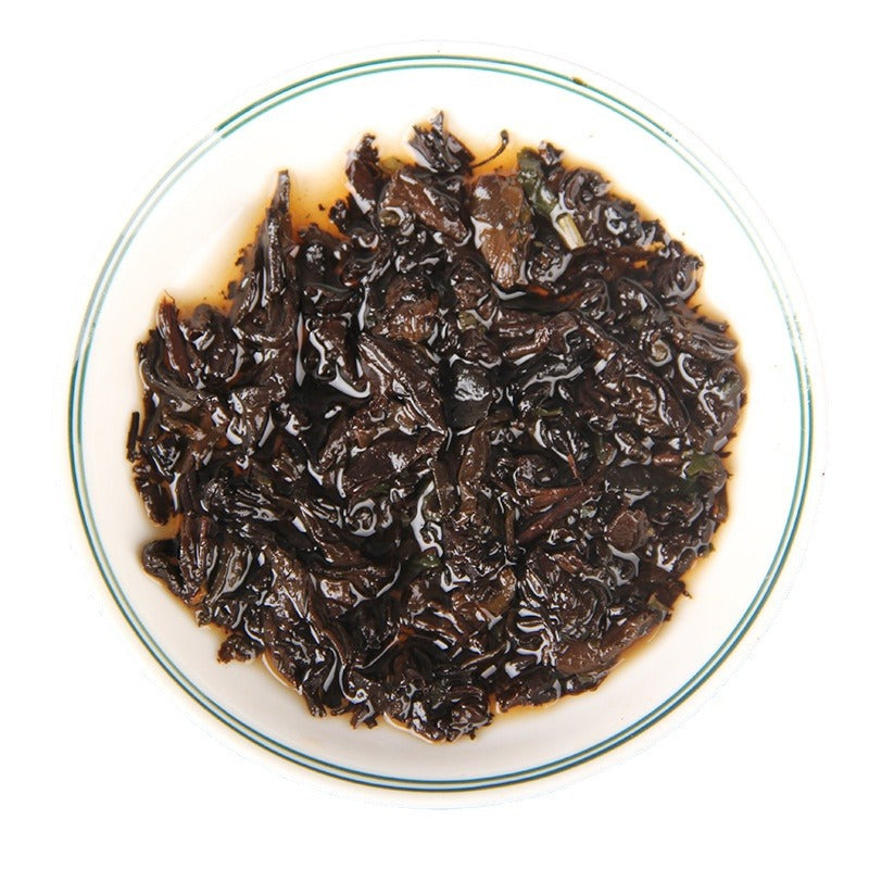 Infused leaves from glutinous rice aroma ripe Pu-erh mini tuocha