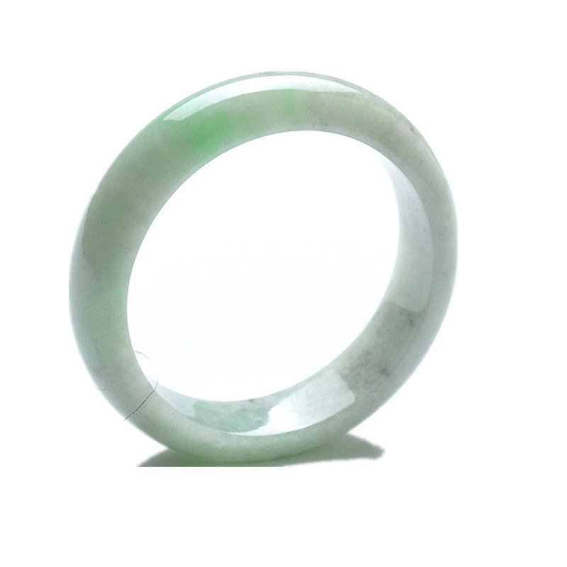 Grade A Myanmar jadeite bangle with translucent white base and green floating inclusions