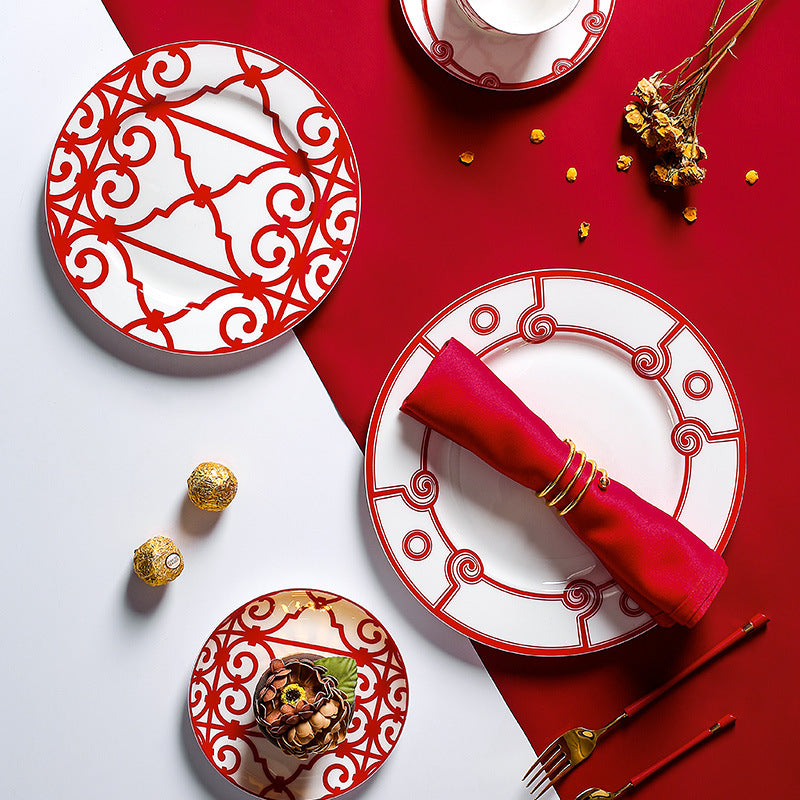 Grande red and white geometric plates styled for dessert and entertaining