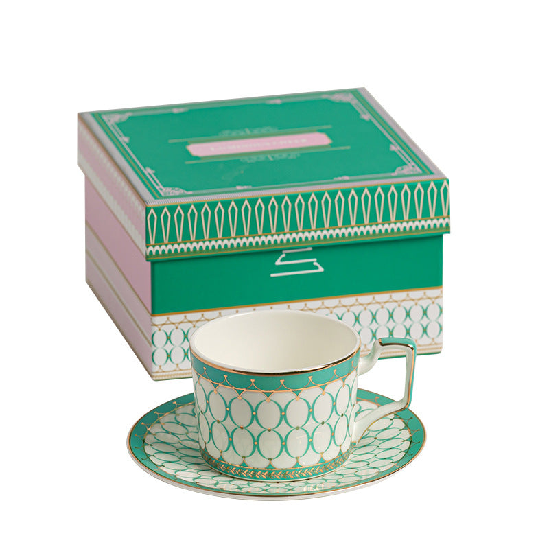 Green Pearl geometric cup and saucer in green, ivory and gold with matching presentation gift box