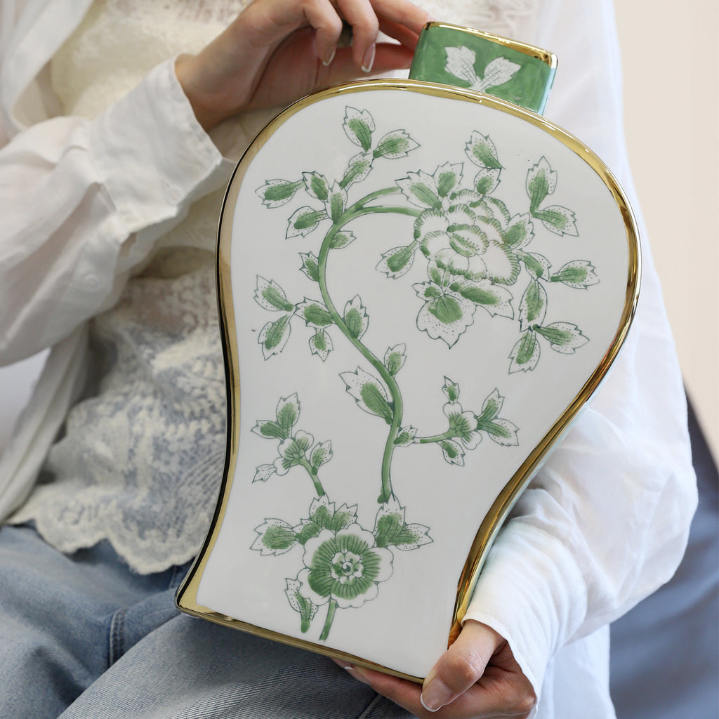 Tall green peony moon flask ceramic vase shown handheld